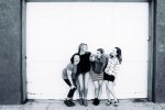 grayscale-photography-of-four-women-wearing-clothes-1065081