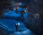 person-holding-flashlight-in-road-2011367
