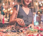 woman-selecting-beaded-jewelry-896018 widescreen