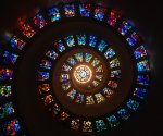 worms-eye-view-of-spiral-stained-glass-decors-through-the-161154